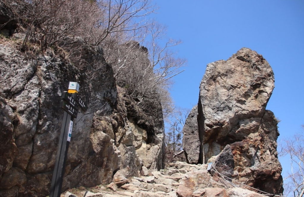 Two massive natural rock pillars forming a gate-like structure at 1,700m altitude, known as the "Triumphal Arch" of Jirisan.