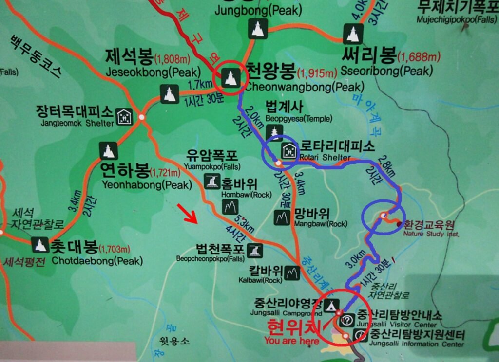 A detailed hiking map of the Jungsan-ri trail leading to Cheonwangbong peak, highlighting the shuttle bus route, major rest stops, and the steep summit path.